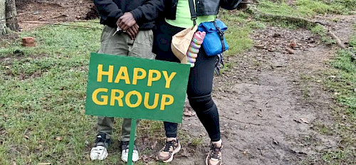 a young female tourist ready to start gorilla trekking